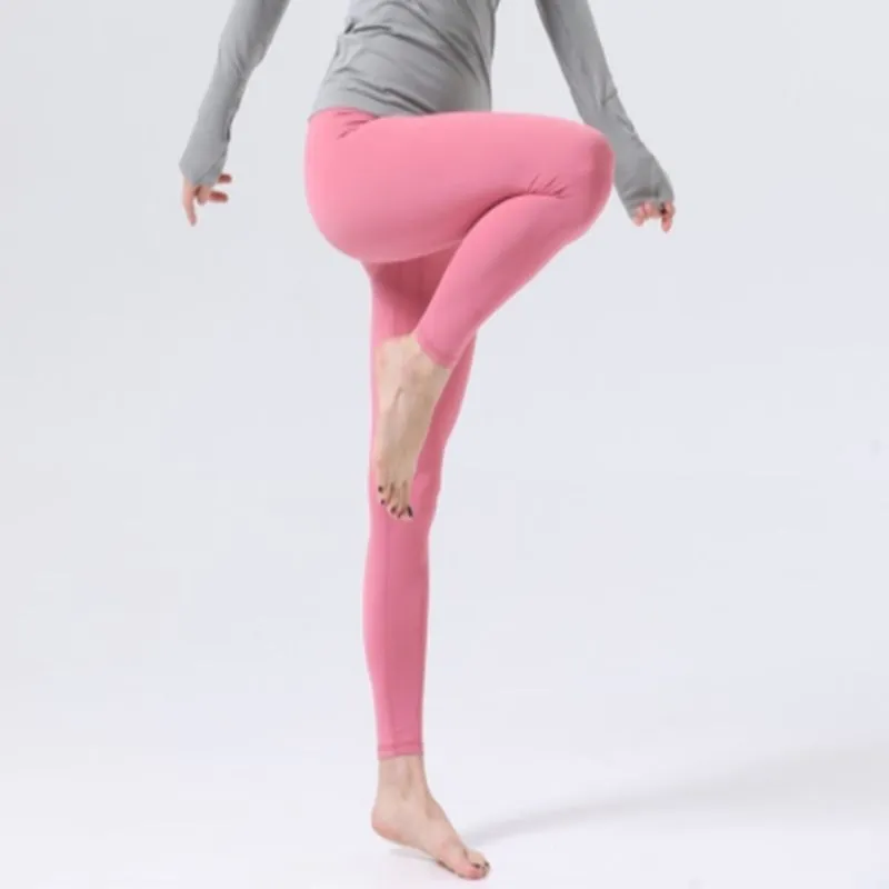 New yoga clothes nylon nude feeling sports women`s high waist yoga pants four sides high elastic moisture absorption nine points pants