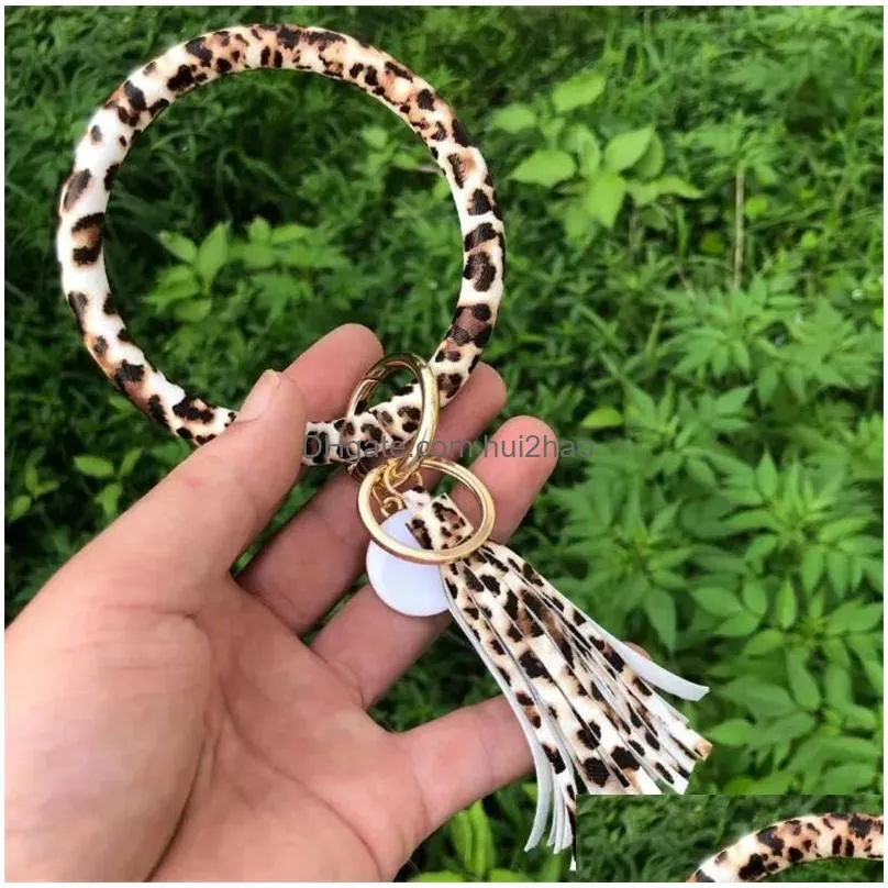 fashion party favor multiple designs sun flower pattern key chain leather wrap tassels bracelets keychain wristlet bracelet tassel round bangle