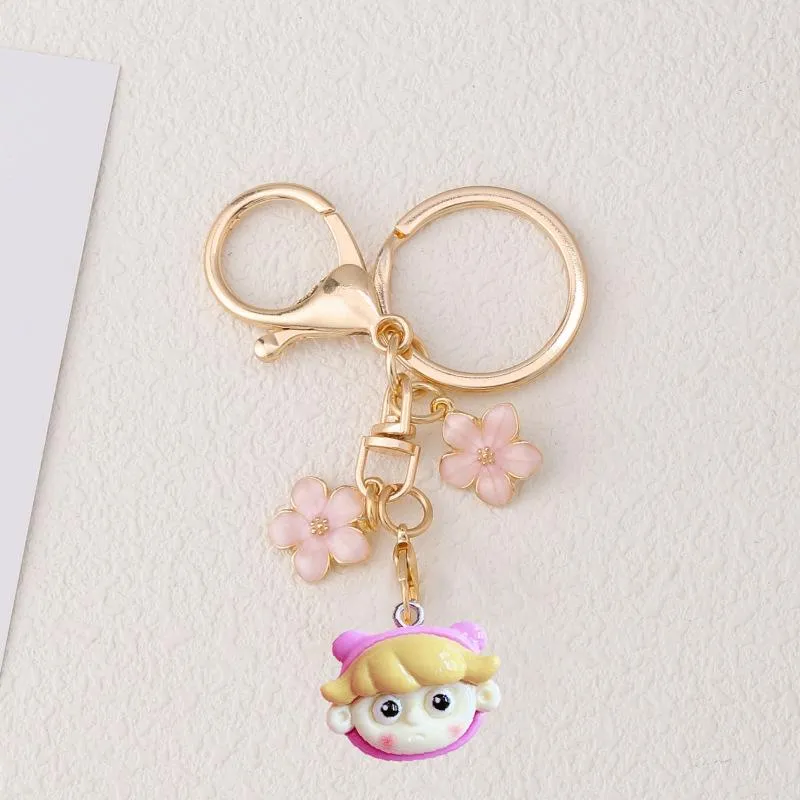 Cartoon Doll Head Keychains With Flower Design Cute Nail
