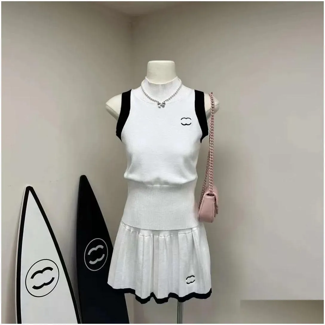 Women`s casual dress summer fashion explosion designer brand women`s top dress knitted cotton sleeveless solid color sexy dress elastic tight mini
