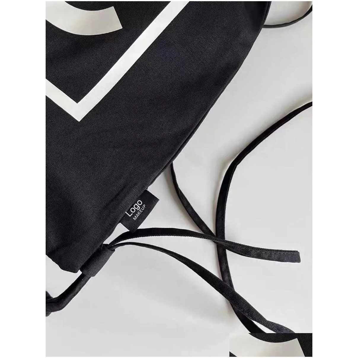 Designer Women`s Fashion Black White Canvas Bag Classic Logo Printed Backpack Large Capacity Shopping Bag Single Shoulder Bag Beach Portable Environmental