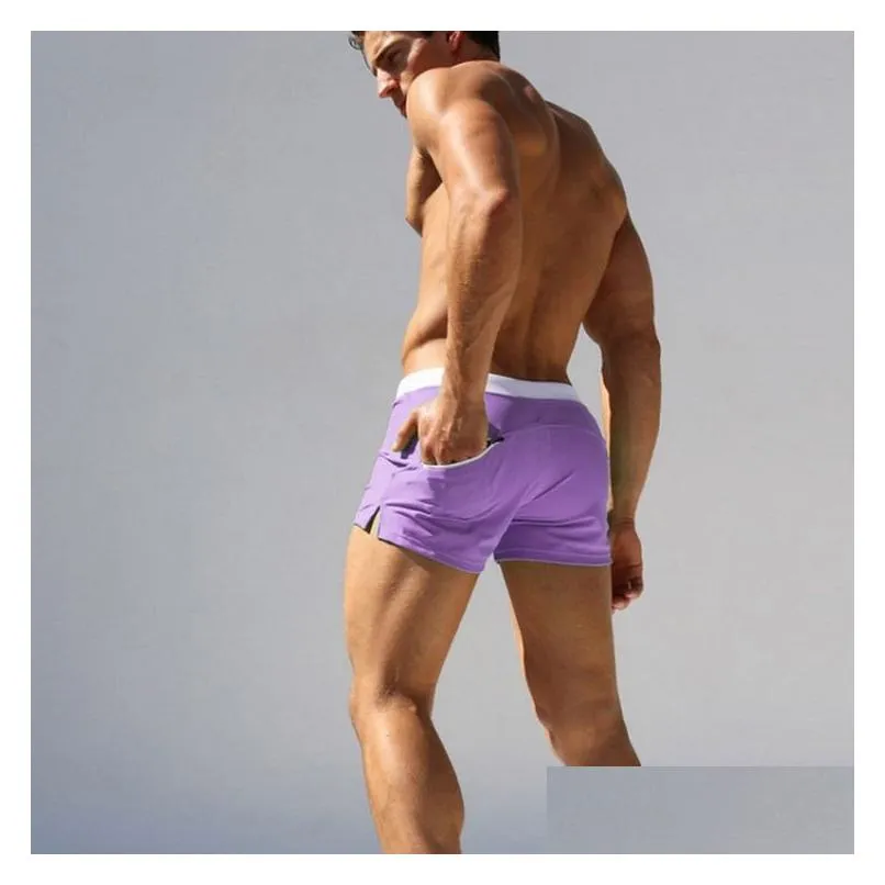 European and American men`s colorful fashion back pocket design beach breathable quick drying shorts lace-up boxer swimming trunks