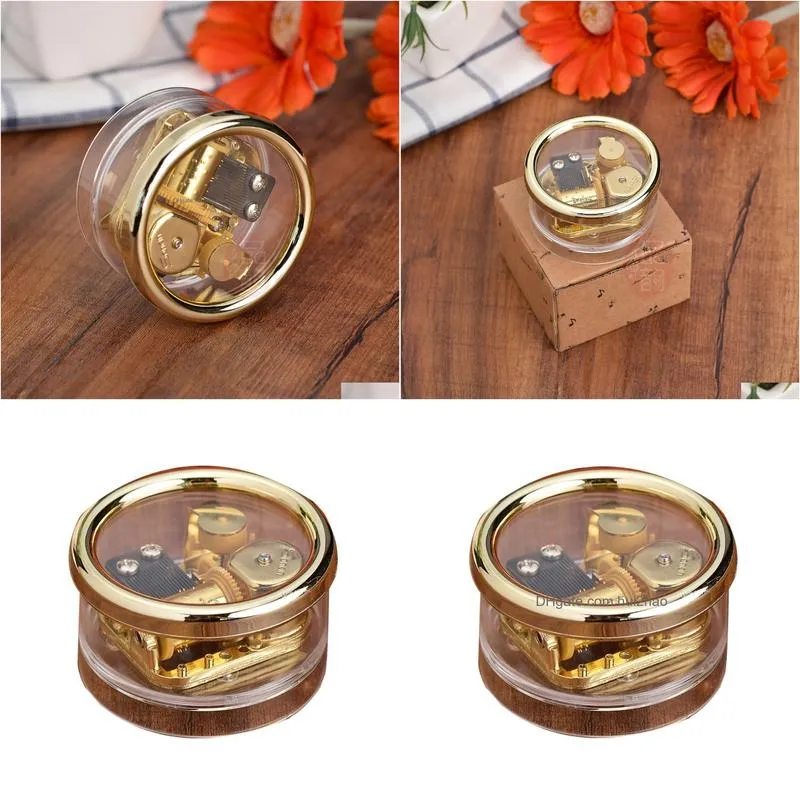 wholesale circular music box acrylic hand crank musical box golden movement melody castle in the sky gift