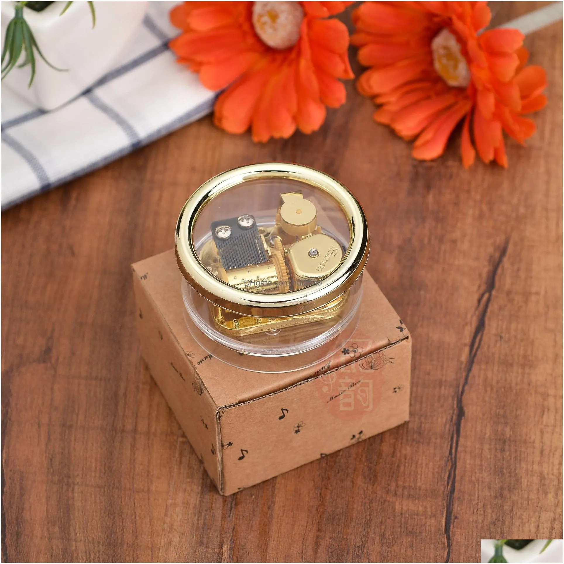 wholesale circular music box acrylic hand crank musical box golden movement melody castle in the sky gift