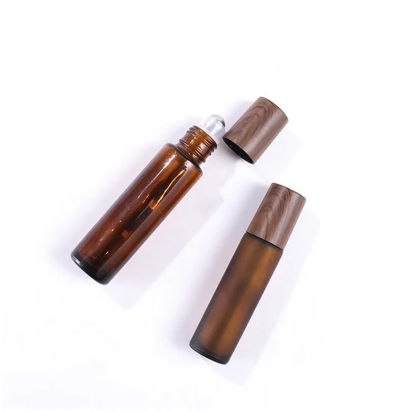 Roll On Bottles Wholesale 5Ml 10Ml 15Ml Amber Glass Roll-On Wood Grain Plastic Cap Frosted Essential Oil Per Bottle With Stainless Dro Dh1Zr