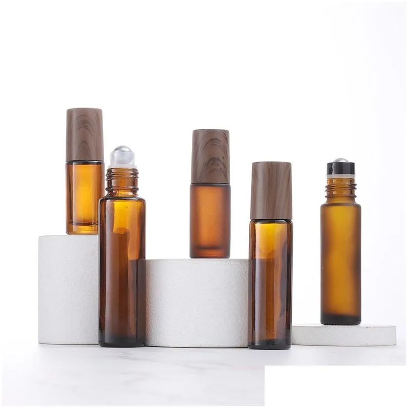 Roll On Bottles Wholesale 5Ml 10Ml 15Ml Amber Glass Roll-On Wood Grain Plastic Cap Frosted Essential Oil Per Bottle With Stainless Dro Dh1Zr