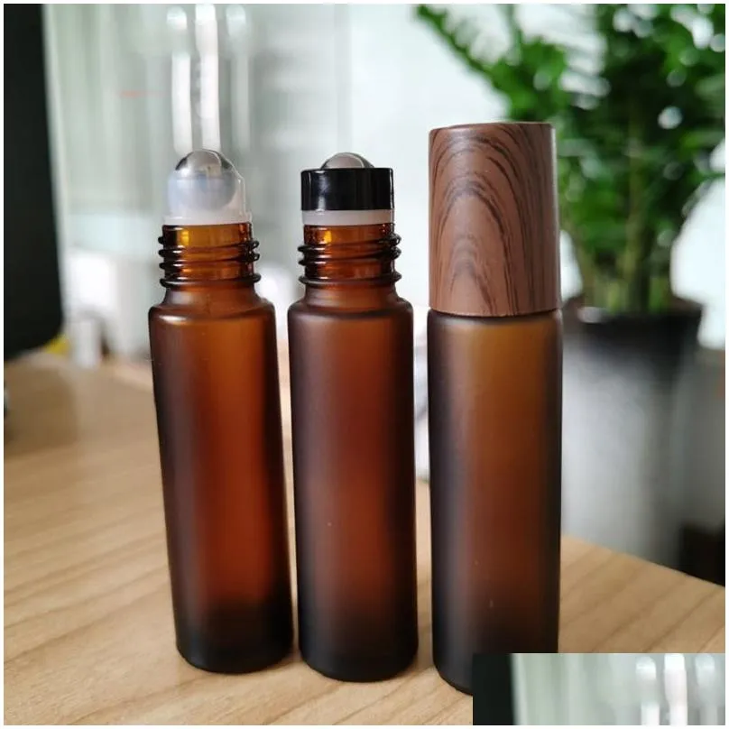 wholesale 5ml 10ml 15ml Amber Glass Roll-on bottles Wood Grain Plastic cap Frosted Essential Oil Perfume Bottle with Stainless Steel