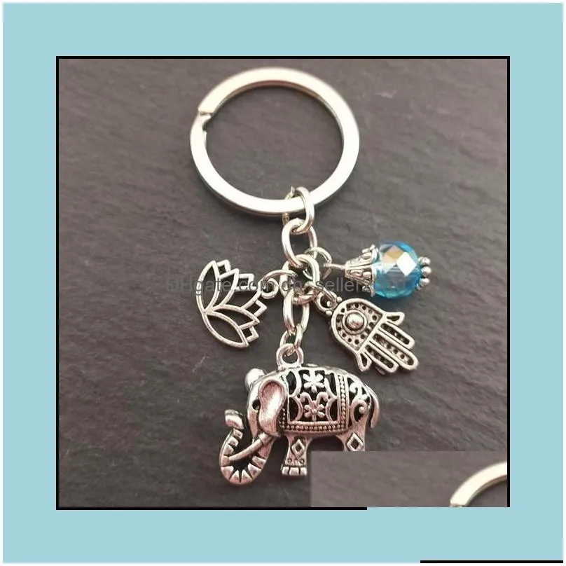 Keychains 1Pc Tribal Ethnic Keychains Unique Bohemia Gift Key Holder Lotus Jewelry Hand Elephant Car Keychain For Women Drop Delivery