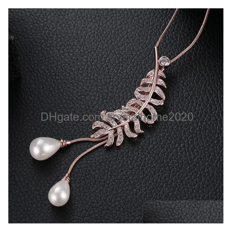 Pendant Necklaces 2021 Luxurious Crystal Feather Jewelry Womens Autumn And Winter Long Sweater Chain Pendant Statement Necklace Drop D Dh1Yz