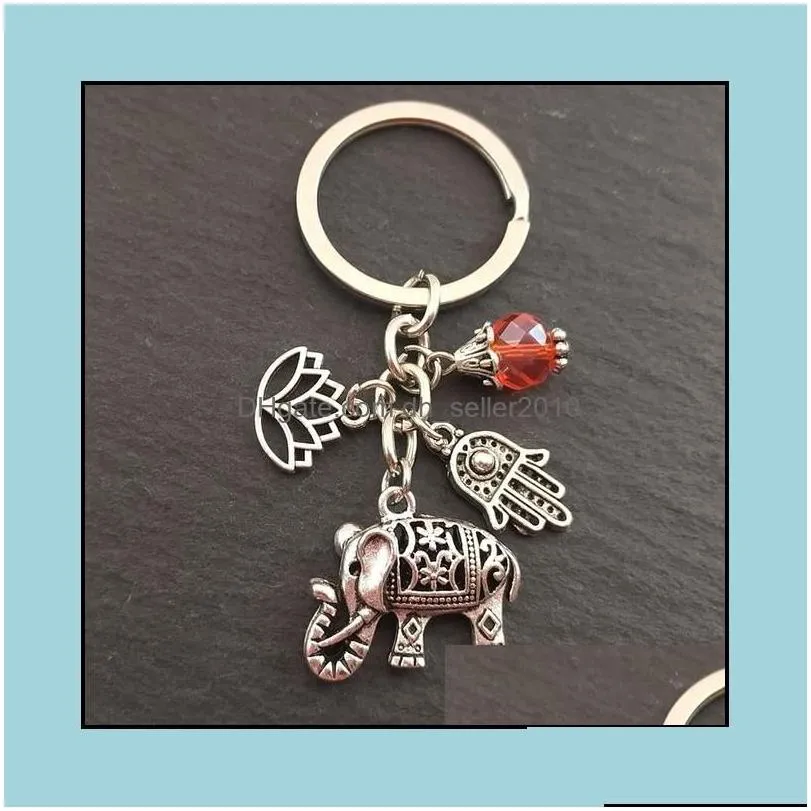 Keychains 1Pc Tribal Ethnic Keychains Unique Bohemia Gift Key Holder Lotus Jewelry Hand Elephant Car Keychain For Women Drop Delivery