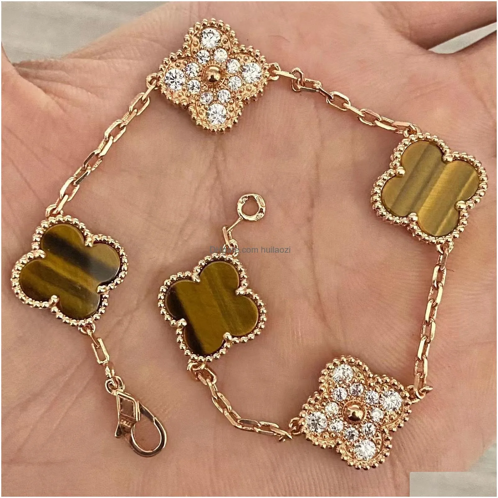 18k gold four-leaf clover charm bracelet with diamond accents - shell motif unisex fashion jewelry perfect for valentines day