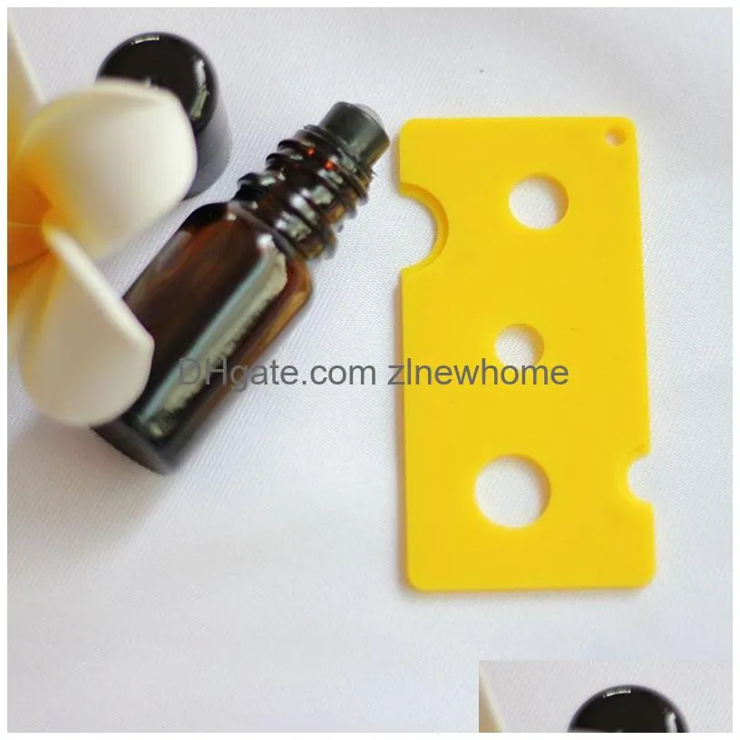  oils bottles opener  oil key tool for easily remove roller caps orifice reducer inserts on most bottles