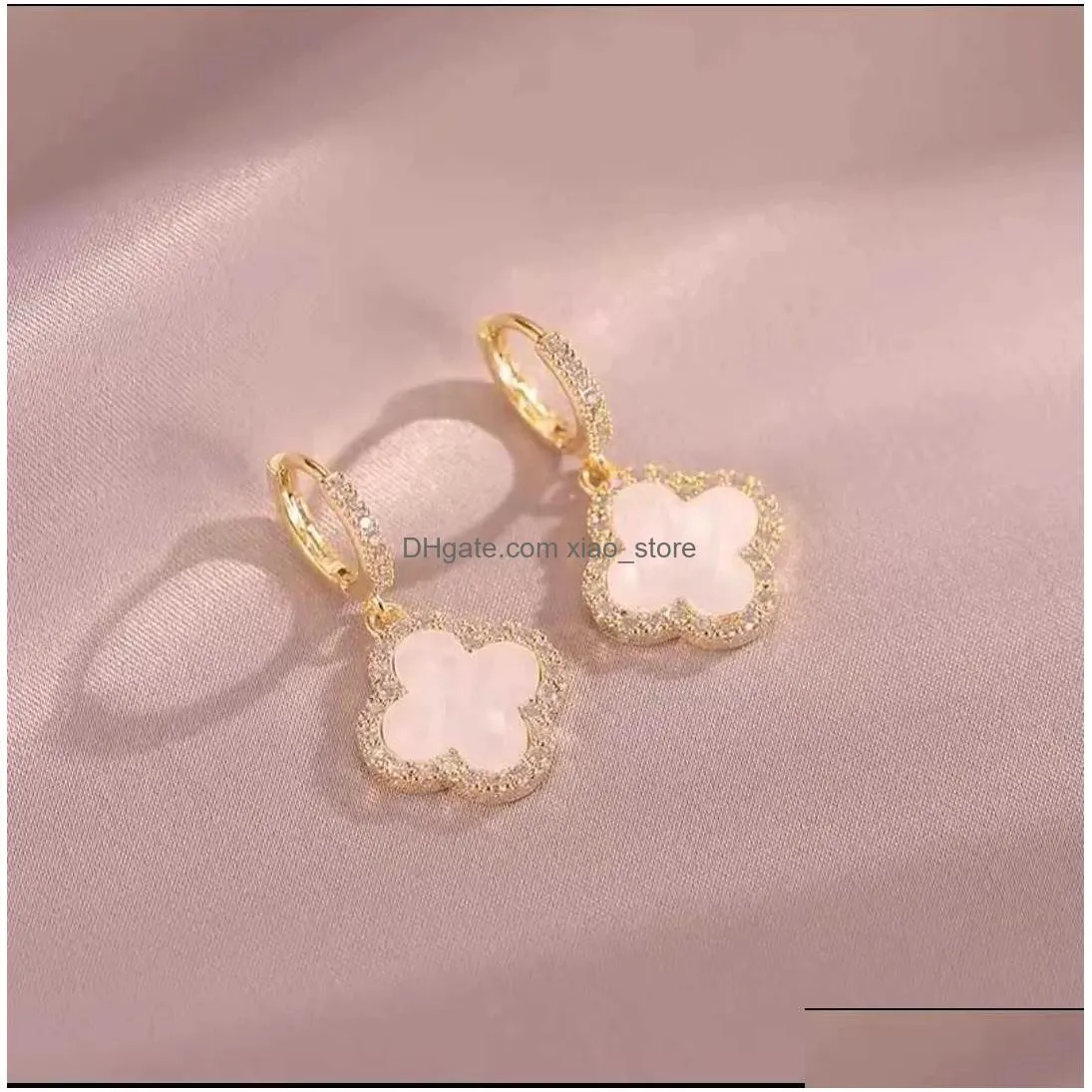 designer earrings clover earrings for women senior classic small fragrant wind earrings clover earrings 18k gold light luxury flash unisex