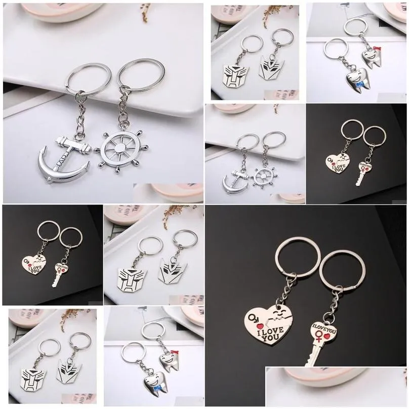 Keychains Lanyards Couple Keychain Creative Metal Transformers Hanging Ring Gift7301903 Fashion Accessories Othkz