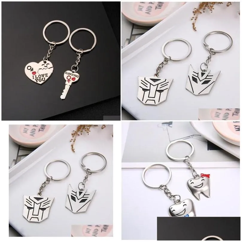 Keychains Lanyards Couple Keychain Creative Metal Transformers Hanging Ring Gift7301903 Fashion Accessories Othkz