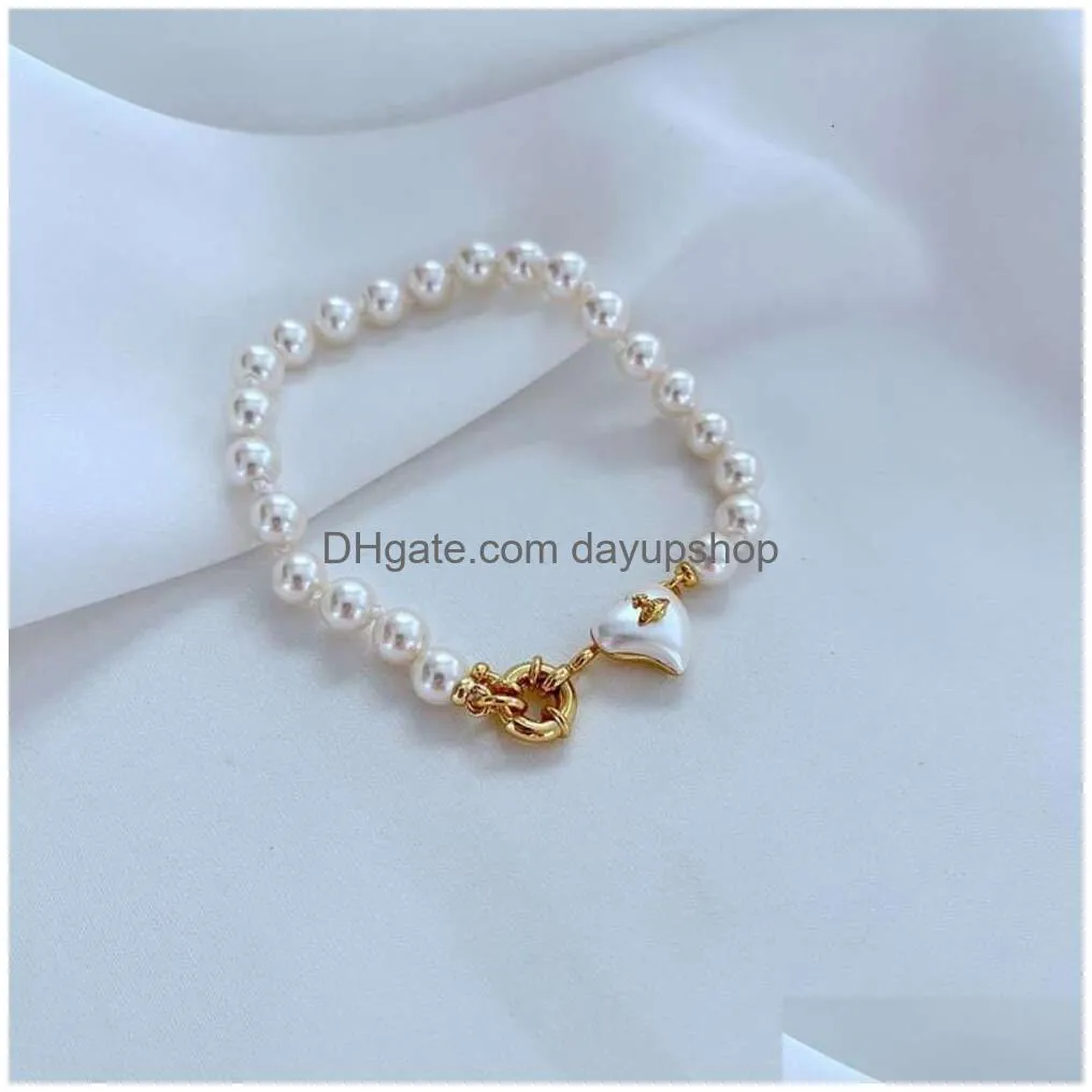Designer High Quality Cold Breeze Artificial Knotting  Pearl Heart Opening Gold-Plated Western Empress Dowager Temperament Women Dhkgf