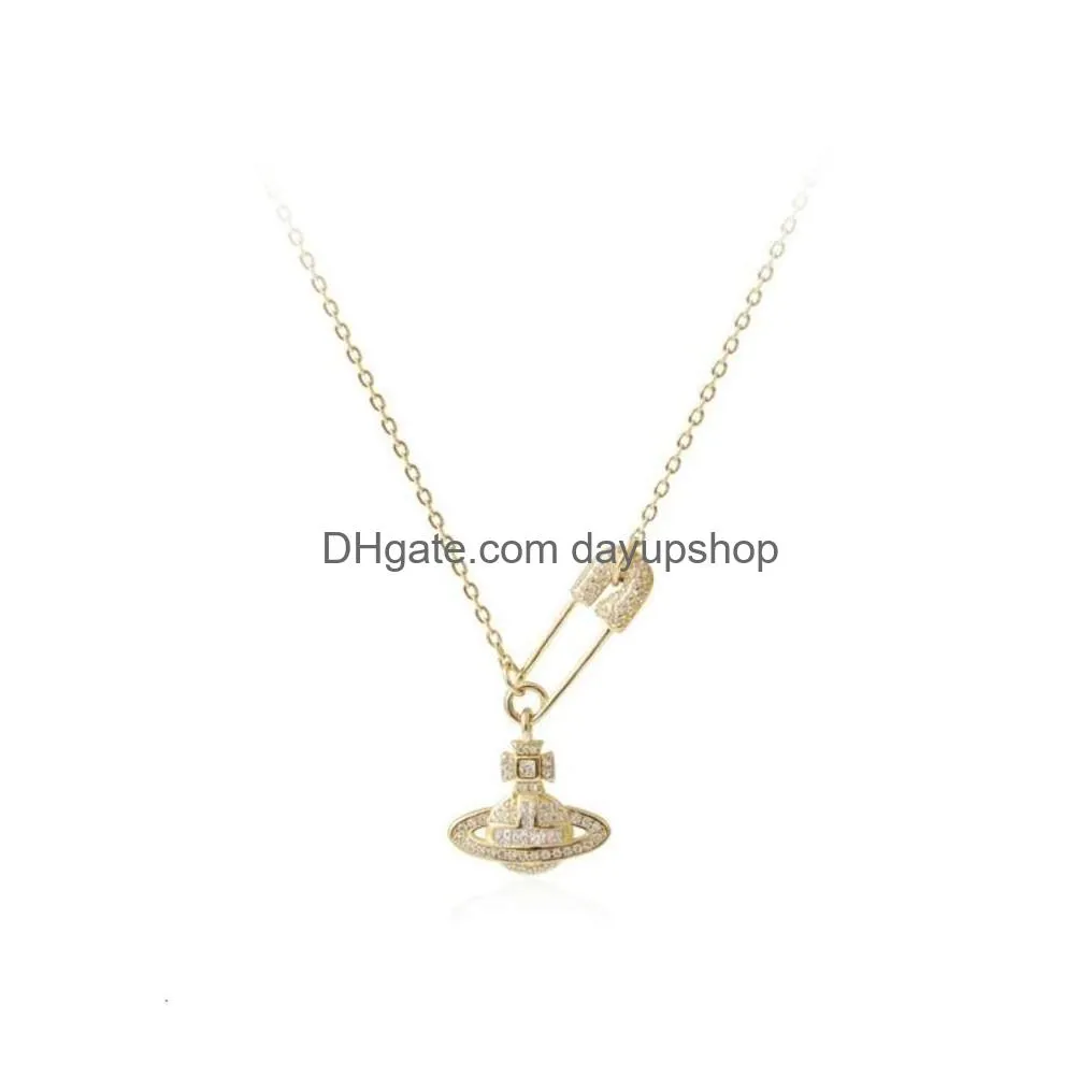 Designer High Quality Empress Dowager Xi Pure Sier S Pin Korean Version Necklace Womens Snake Bone Cross Chain Pendant Drop Delivery Dhvba