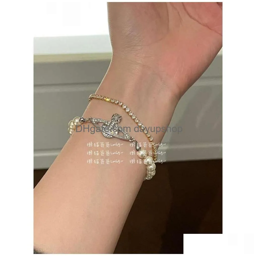 Designer High Quality The Western Empress Dowager Planet Is Same Type Of Agile Pearl Bracelet Instagram A Trendy And Minimalist Drop Dhdi6