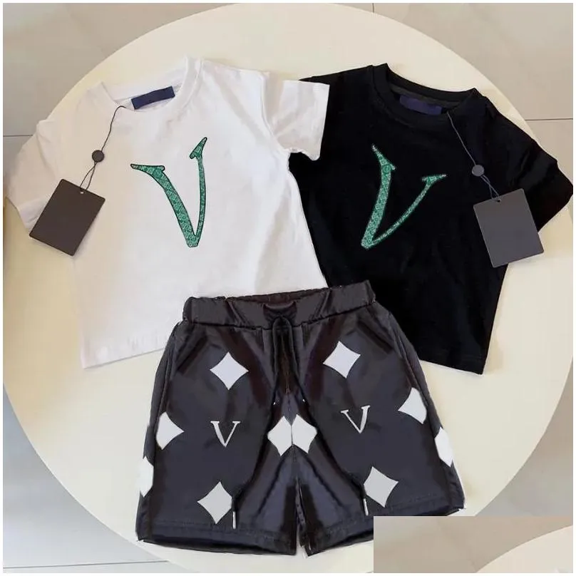 Clothing Sets New Fashion Designer Kids Clothes Summer Sets Boys Tracksuits Casual Letter Baby Girls Kid T Shirts Pants Infants Childr Otekn