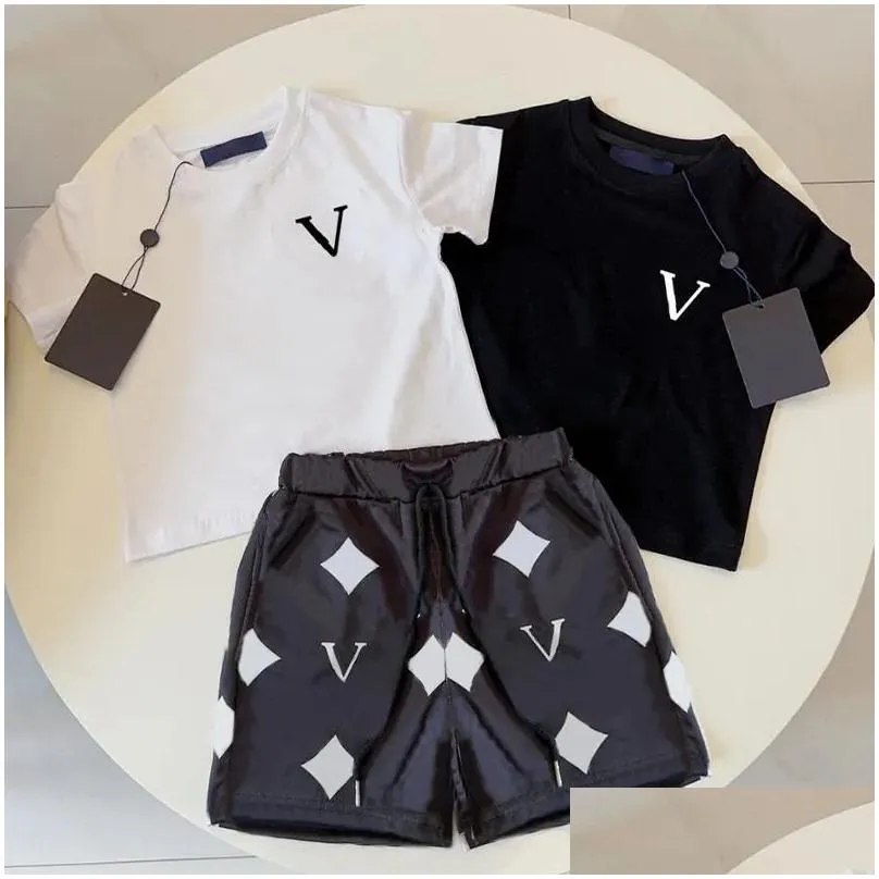 Clothing Sets New Fashion Designer Kids Clothes Summer Sets Boys Tracksuits Casual Letter Baby Girls Kid T Shirts Pants Infants Childr Otclu