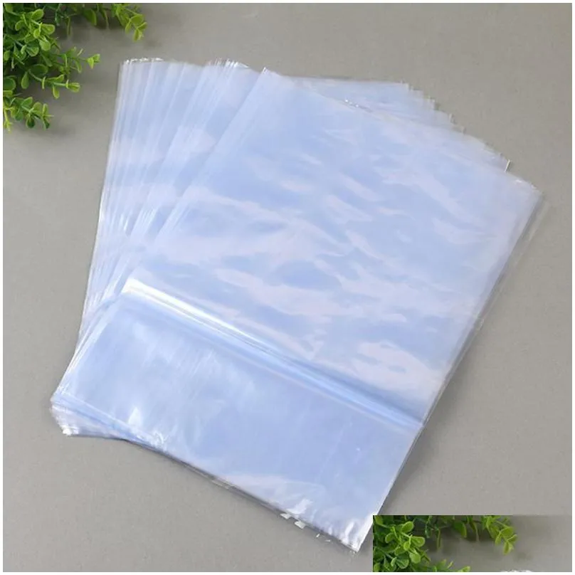 2021 new 100pcs pvc heat shrink wrap film bag plastic membrane shrinkable packaging clear cosmetics books shoes storage packing