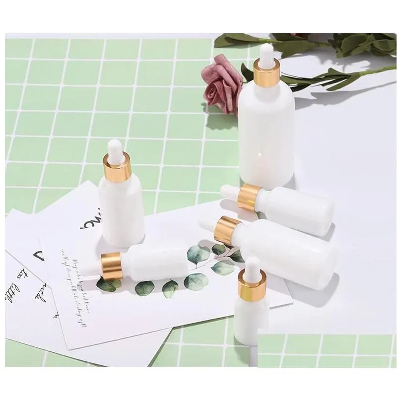 wholesale newest 10ml 15ml 20ml 30ml 50ml 100ml glass dropper bottles white porcelain  oil cosmetic containers with gold cap