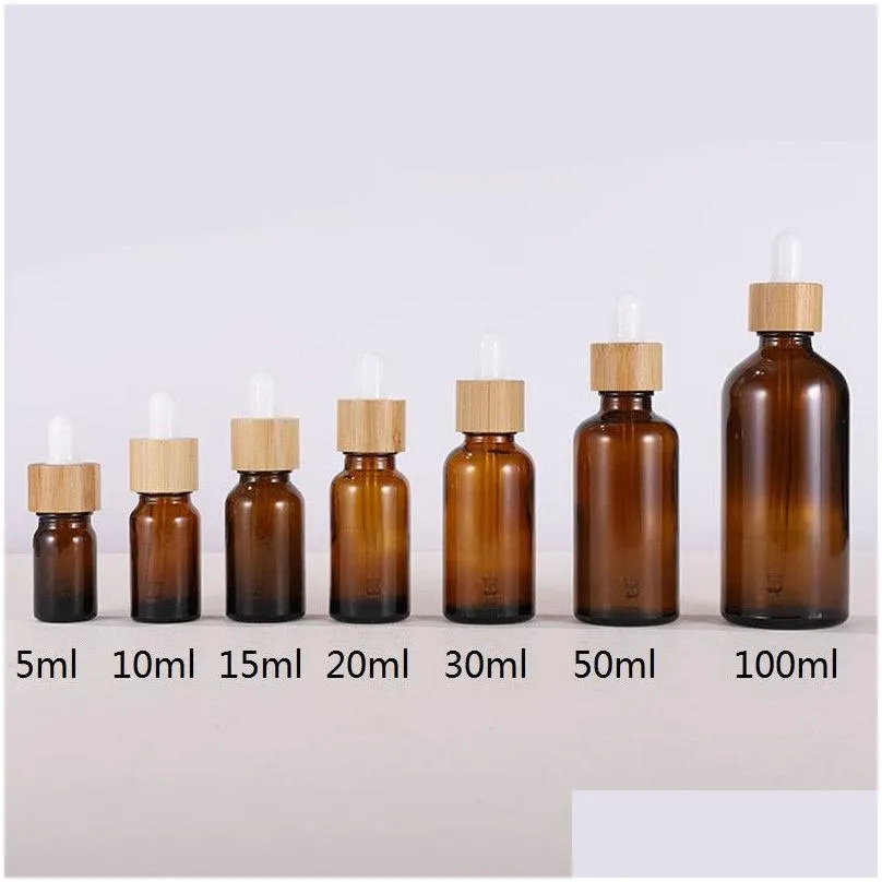 wholesale amber glass dropper bottle with bamboo lids  oils bottles sample vials for perfume cosmetic liquids 15ml 20ml 30ml 50ml