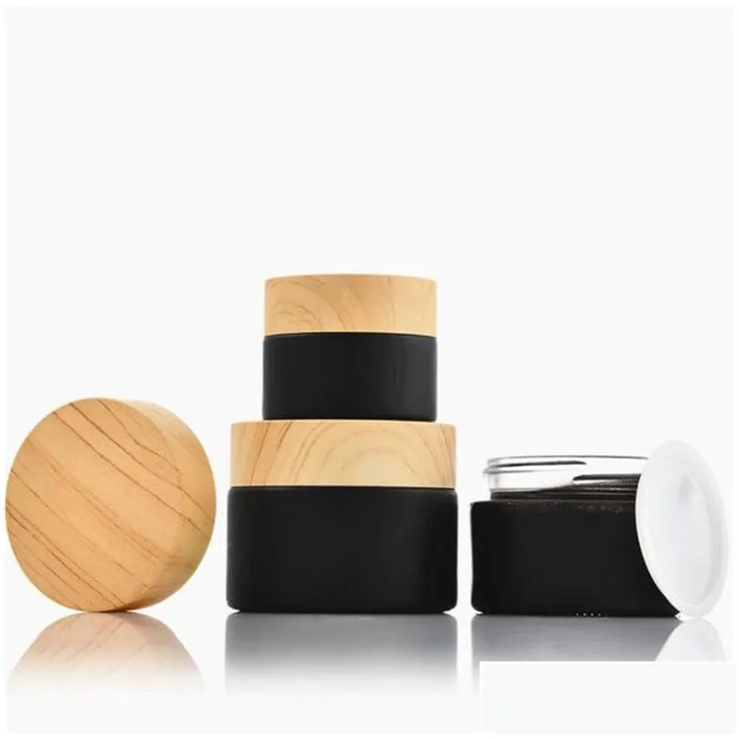 wholesale 5g 10g 15g 20g 30g 50g black frosted glass cosmetic jars cream bottle packing container with plastic wood grain cover