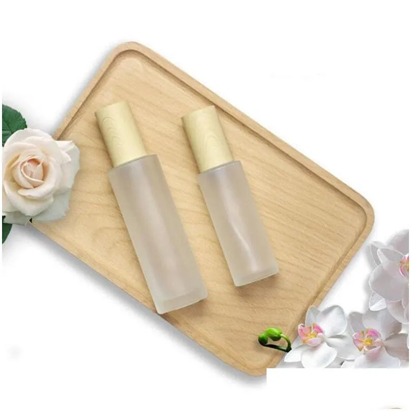 wholesale 30ml 40ml 60ml 80ml 100ml frosted glass cream jar with plastic imitated wood lid makeup lotion pot spray pump bottle