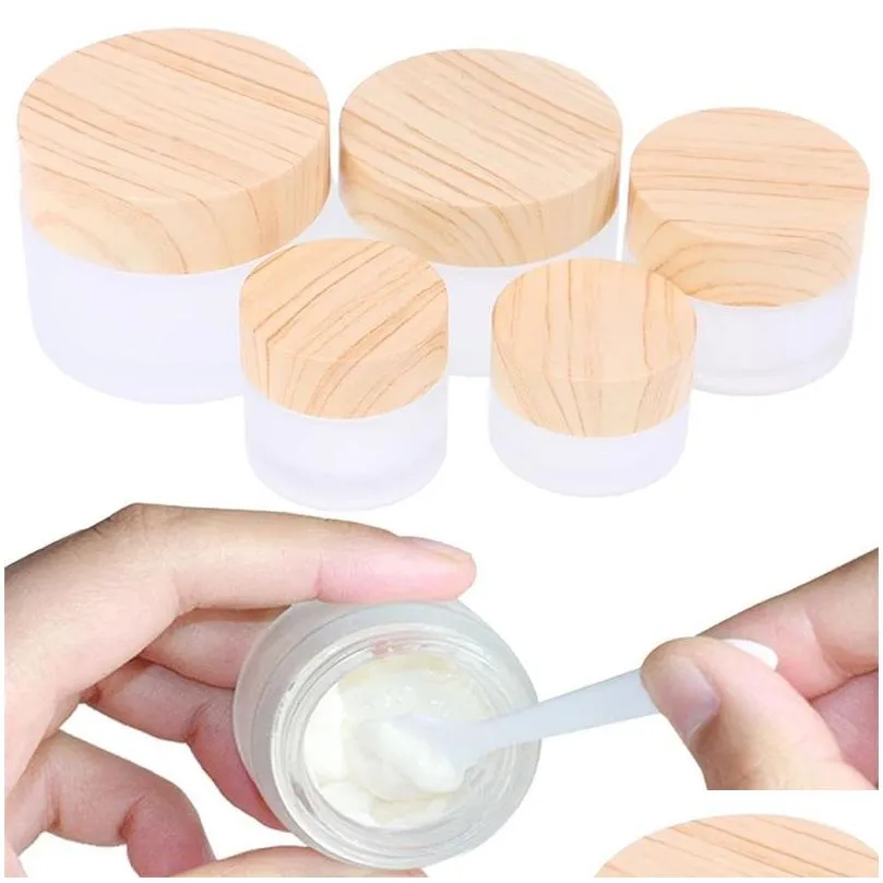 wholesale frosted glass jar skin care eye cream jars refillable bottle cosmetic container pot with plastic wood grain lids