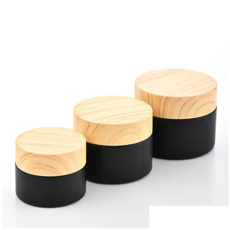 wholesale 5g 10g 15g 20g 30g 50g black frosted glass cosmetic jars cream bottle packing container with plastic wood grain cover