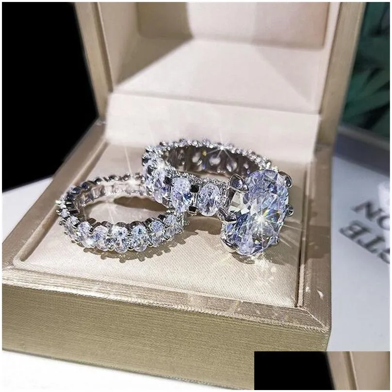 2021 New Sparkling Hot Sale Luxury Jewelry Couple Rings Large Oval Cut White Topaz CZ Diamond Gemstones Women Wedding Bridal Ring Set