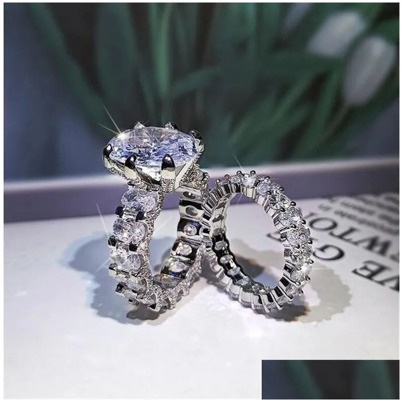 2021 New Sparkling Hot Sale Luxury Jewelry Couple Rings Large Oval Cut White Topaz CZ Diamond Gemstones Women Wedding Bridal Ring Set