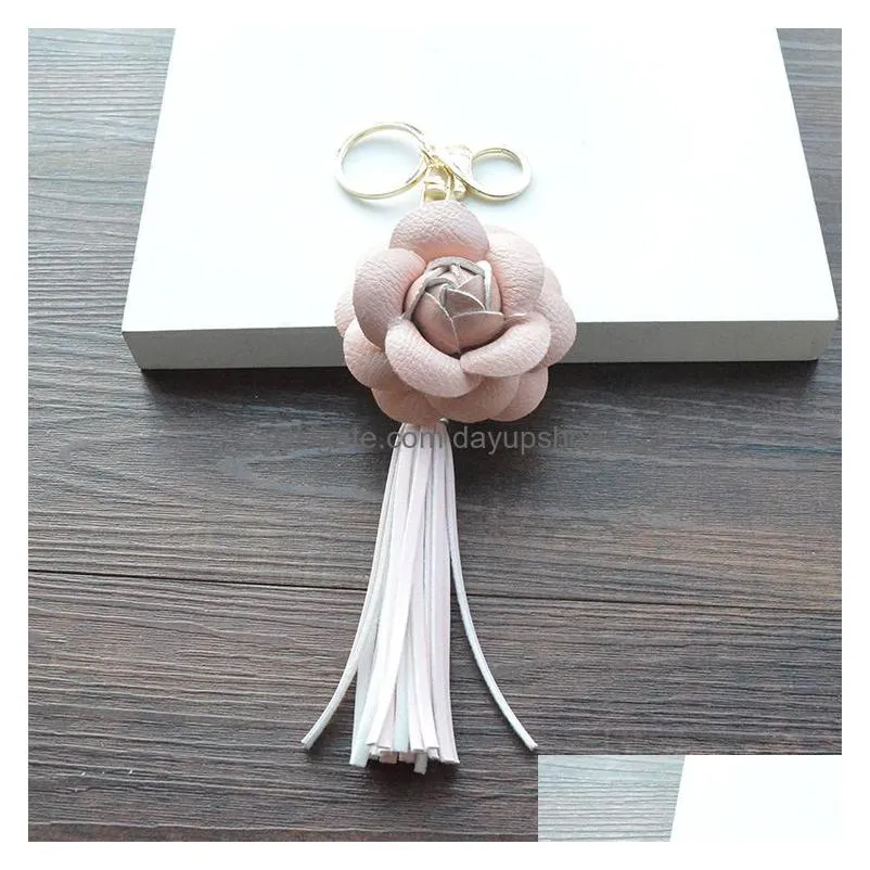 good aaddadd pu tassel key chain camellia bag pendant car key ring phone shell decoration kr307 keychains mix order 20 pieces a lot