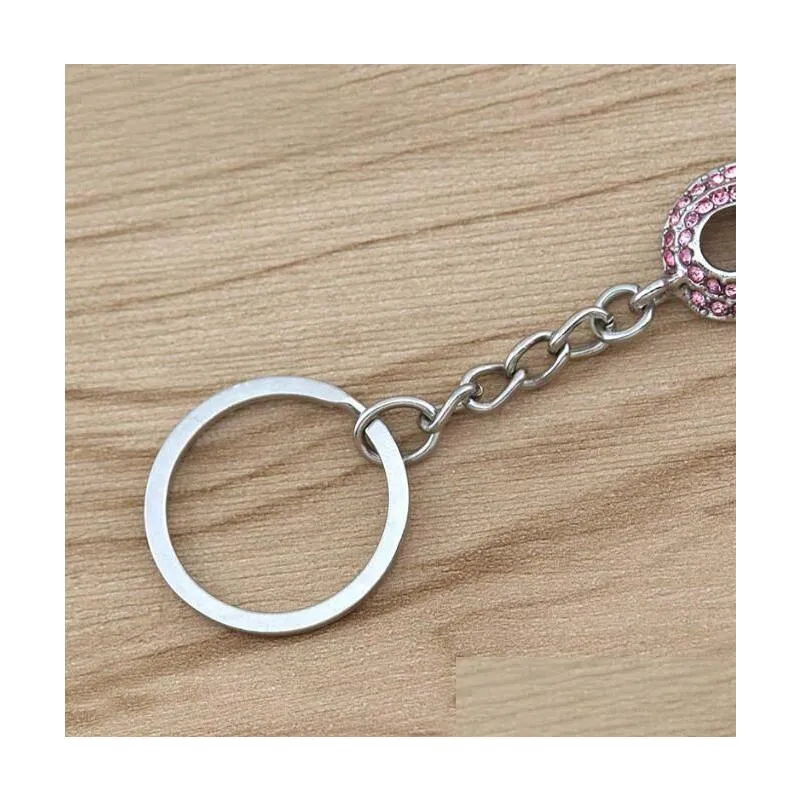 pink ribbon keychains caring for sign public advertising breast cancer awareness keychains international logo key ring reminder people