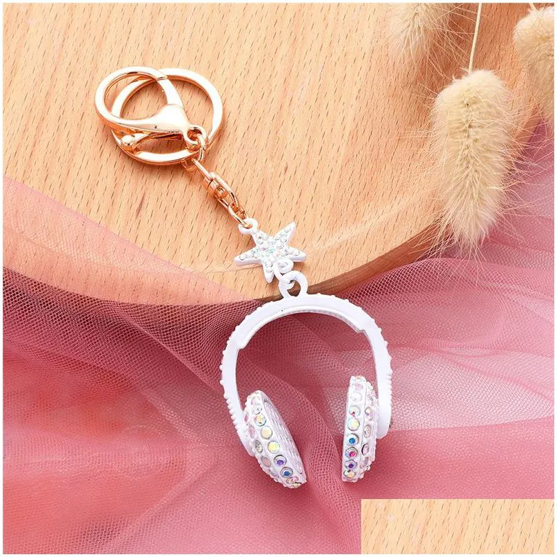 fashion men high quality car keychain diy alloy holder chain multi-color earphone headphones headset bag pendant