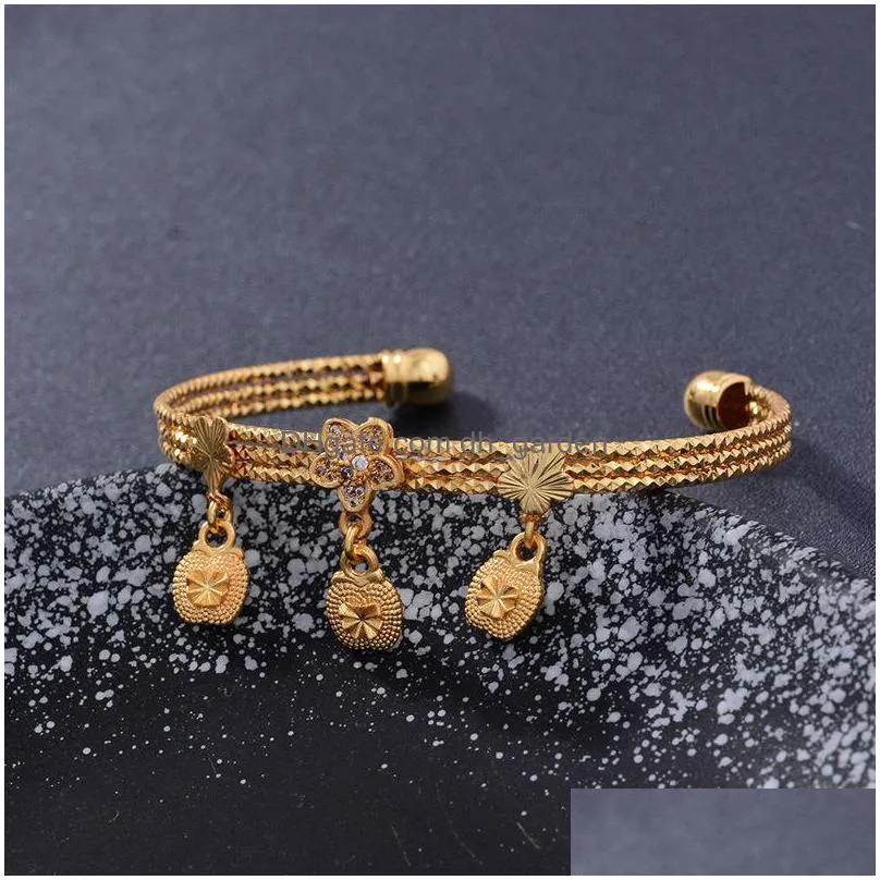 4pcs/lot gold color bangle for girls/baby/kids charm gypsophila bracelet bells flower jewelry child christmas gifts cuff