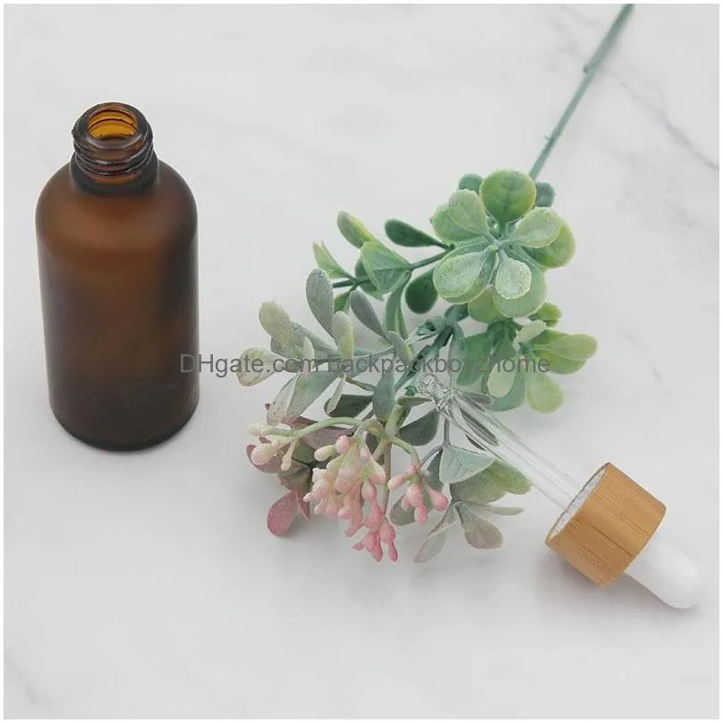 wholesale frosted amber white glass dropper bottle 15ml 30ml 50ml with bamboo cap 1oz wooden essential oil bottles
