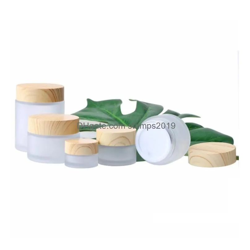 packaging bottles wholesale frosted glass jar cream round cosmetic jars hand face bottle with wood grain cap 5g-10g-15g-30g-50g-100g dh7rv