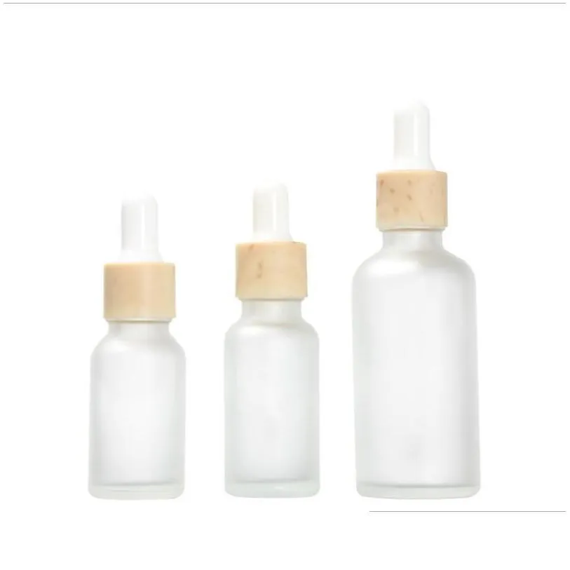 Packaging Bottles Wholesale 15Ml 30Ml 50Ml Frosted Amber White Glass Dropper Bottle With Plastic Wood Grain Cap 1Oz Bamboo  Dhp8Q