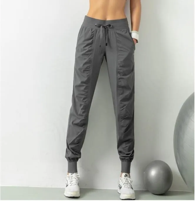 LL Breathable Sports Pants Gym Clothes Women`s Joggers Quick Dry Slim Loose Running Training Fitness Leggings Nine Point Pocket Casual Trouses lu