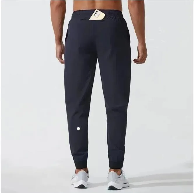 Yoga pants LL Men's Jogger Long Pants Sport Yoga Outfit Quick Dry Drawstring Gym Pockets Sweatpants Trousers Mens Casual Elastic Waist fitness