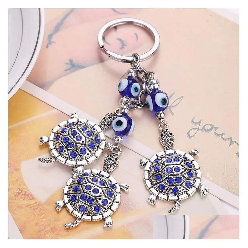 Blue Evil Eye Keychain Ring Jewelry Tortoise Eiffel Tower Keyring Fashion Animals Butterfly Charms Rings Key Chain Holder for Handbags Bag