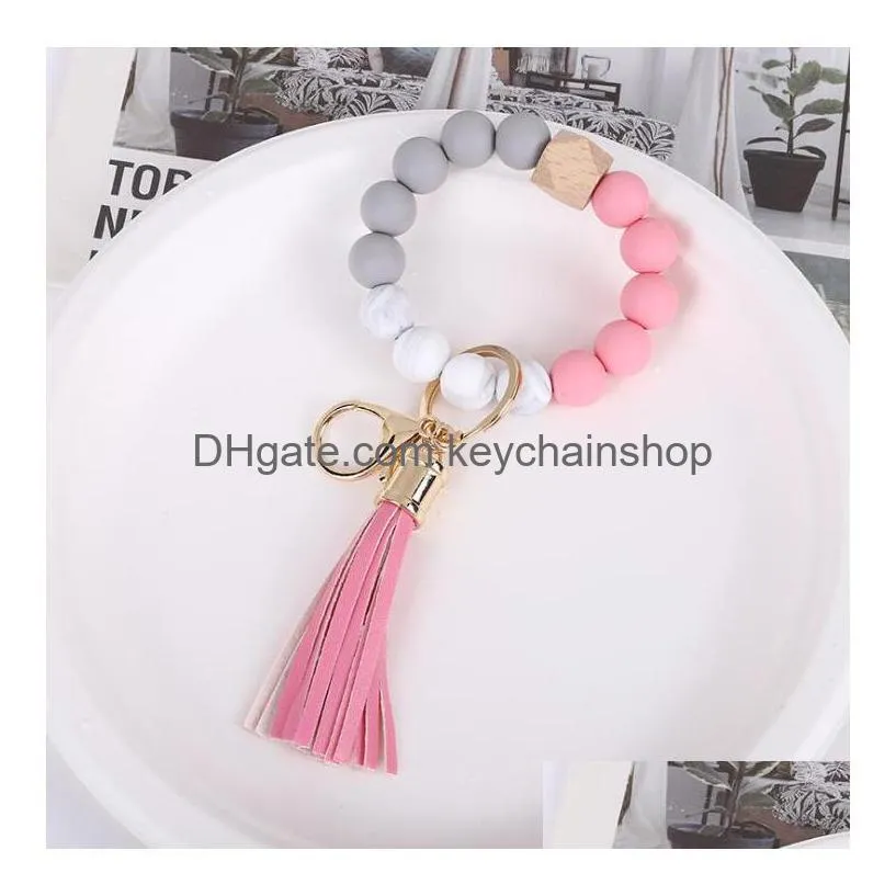 12 colors silicone beads tassel bead string bracelet keychain food grade leopard wooden beads bracelets for women girl key ring wrist