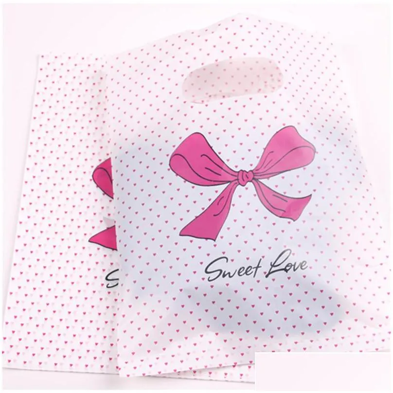 gift wrap design wholesale 100pcs/lot 20x25cm pink sweet love packaging bags for tshirt plastic shopping with dot bow1