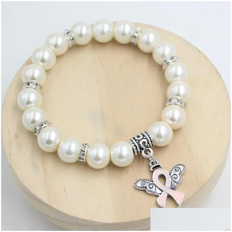 wholesale new arrival pearl bead breast cancer awareness bracelet angel wings pink ribbon charms bracelet jewelry for cancer center