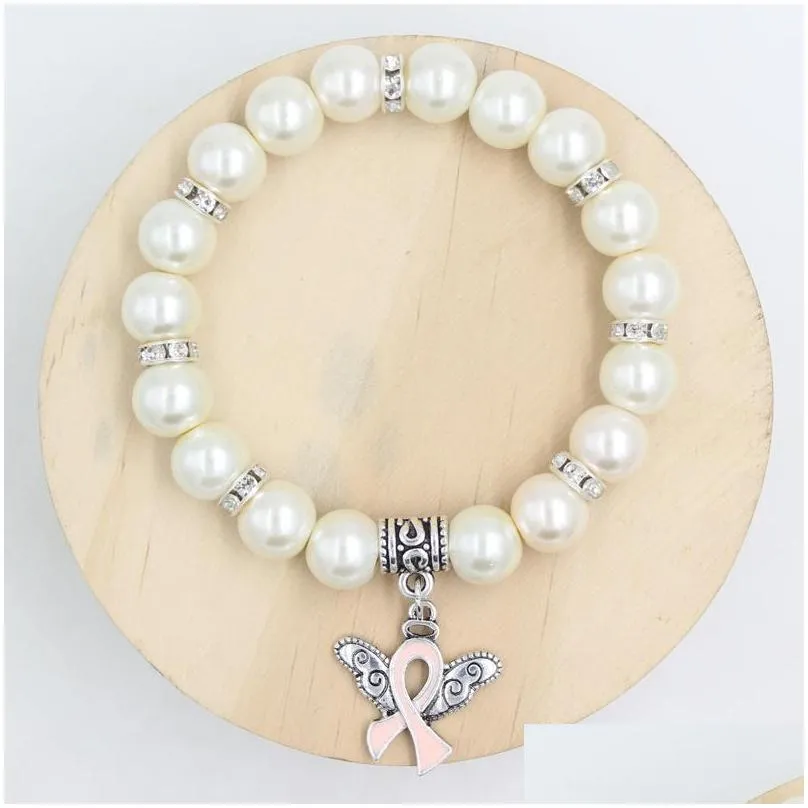 wholesale new arrival pearl bead breast cancer awareness bracelet angel wings pink ribbon charms bracelet jewelry for cancer center