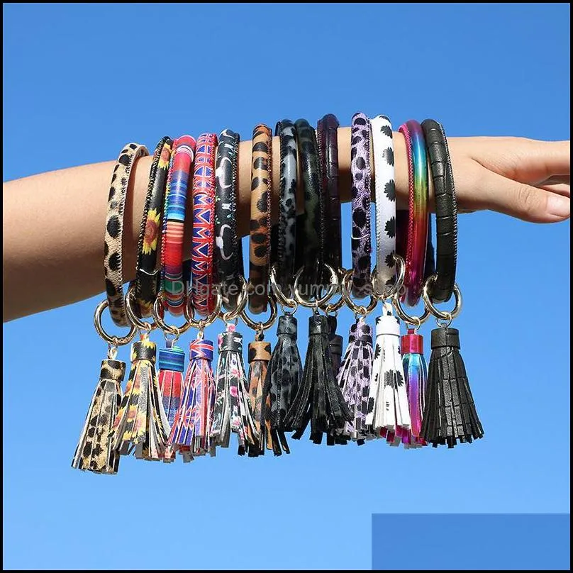 creative pu leather bracelet keychain round piece drop oil tassel pendant leather bracelet 301 q2