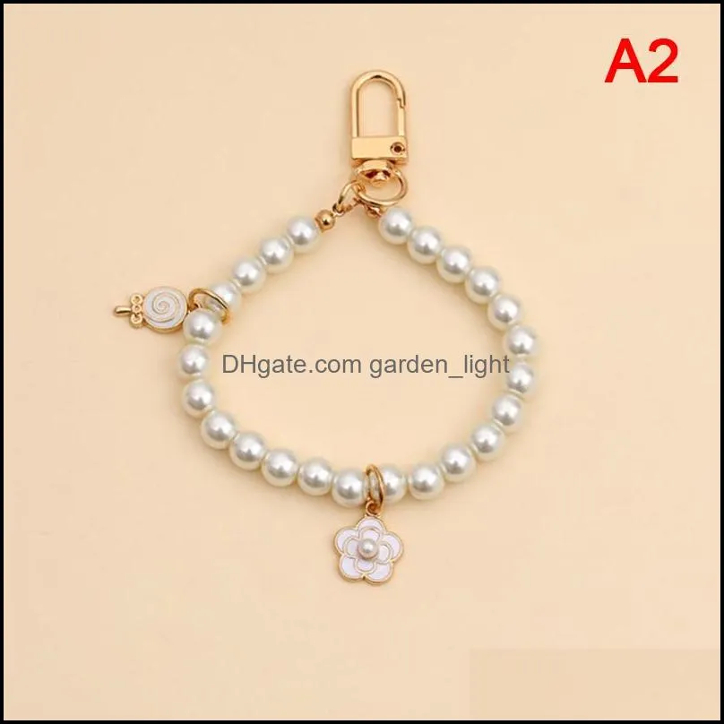 retro beauty head keychain pearl small gift for  pro 1 2 earphone case chain ornaments keyring round pendant