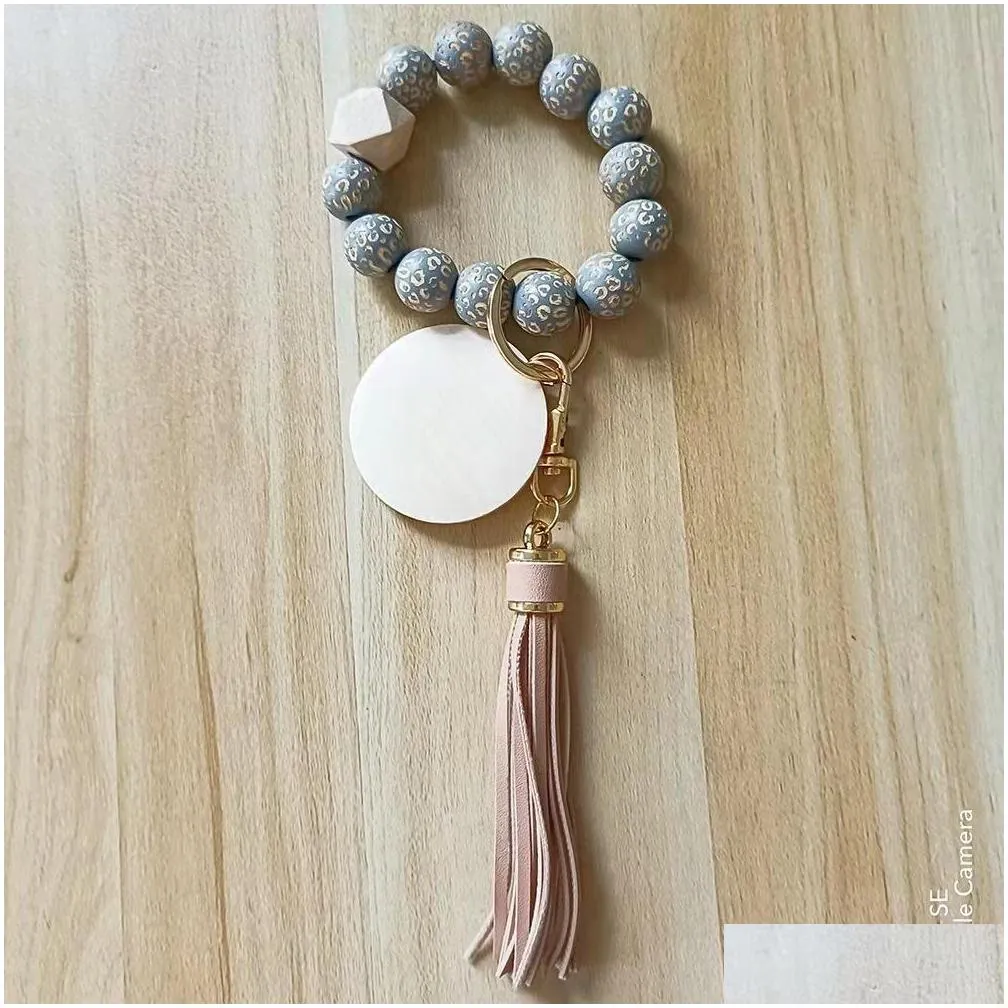 fedex personalized pu leather tassel pendant carved wood bead elastic rope bracelet key chain wholesale multicolor options